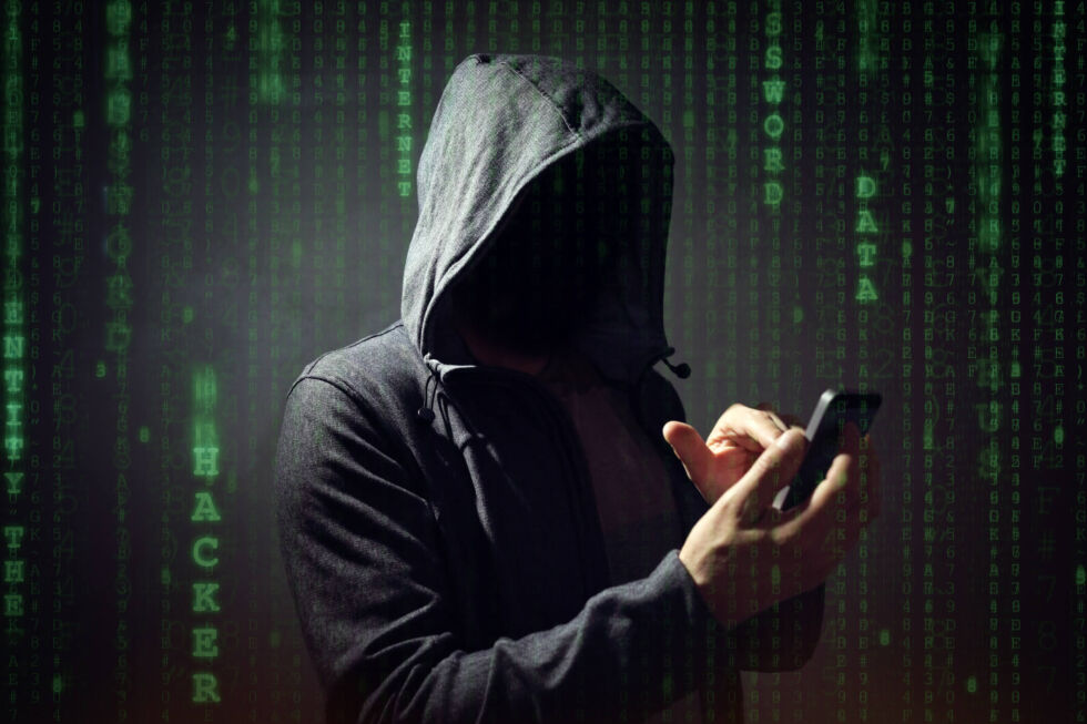 Mobile scams are everywhere, but they usually aren't being perpetrated by scary dudes in hoodies, stock art notwithstanding.