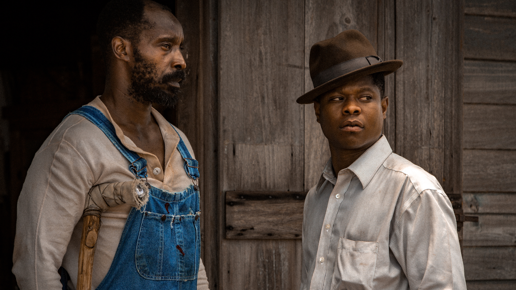Rob Morgan as Hap Jackson and Jason Mitchell as Ronsel Jackson in Mudbound, one of the best netflix movies