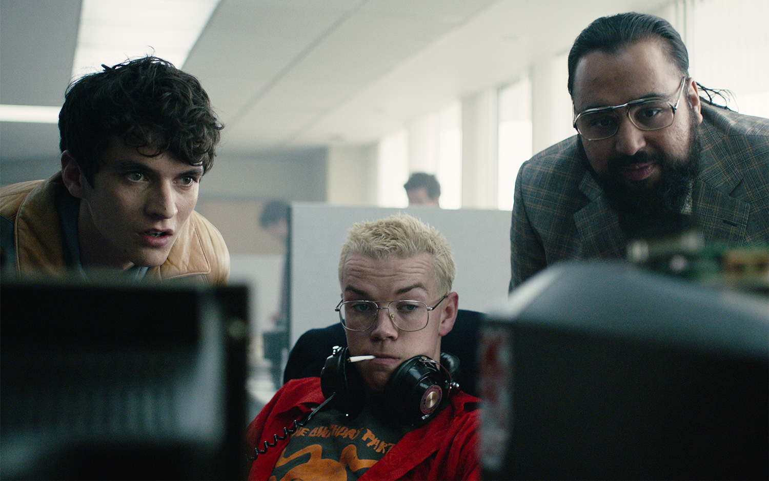 Fionn Whitehead, Will Poulter and Asim Chaudhry in Black Mirror Bandersnatch, one of the best Netflix movies